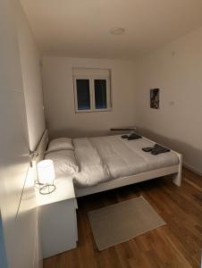 Postel nebo postele na pokoji v ubytování Mimi -Green Hill