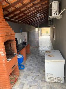 Fotografie z fotogalerie ubytování Casa com piscina em Mongaguá - 400m da praia II v destinaci Mongaguá