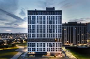 un rendu d'un grand bâtiment avec une ville dans l'établissement Loft 907 Parque Una - Aurora, à Pelotas