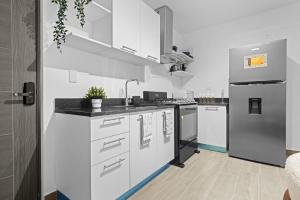 Kuchyň nebo kuchyňský kout v ubytování NOK Designer Loft in Punta Cana + 25 fotografií