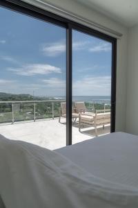 Balkón nebo terasa v ubytování Luxery home in surf city el Sunzal