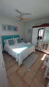 Ένα ή περισσότερα κρεβάτια σε δωμάτιο στο Primavera Pool Paradise +8 φωτογραφίες