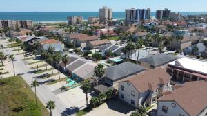 an aerial view of a city with buildings and palm trees at Great Location Pool Near the Beach in South Padre Island