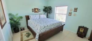 a bedroom with a bed in a room at Great Location Pool Near the Beach in South Padre Island