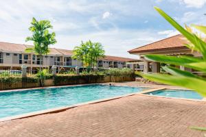 an image of a swimming pool at a villa at Nottingham Villa in Puerto Princesa