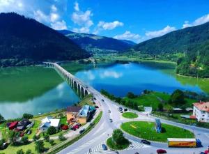 a view of a bridge over a lake at Relax Apartament Bicaz in Bicaz