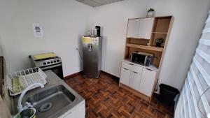 Køkken eller tekøkken på Hidden House + 6 billeder