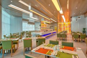 Restaurace v ubytování Al Khoory Atrium