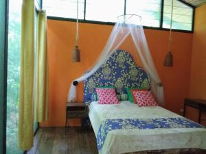 Postel nebo postele na pokoji v ubytování Casa la Colmena