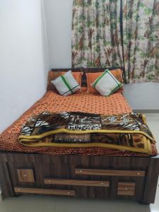 Ένα ή περισσότερα κρεβάτια σε δωμάτιο στο Jay Home stay