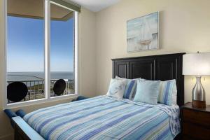 Ένα ή περισσότερα κρεβάτια σε δωμάτιο στο Just a Dream - 26th Floor Luxury - Sapphire