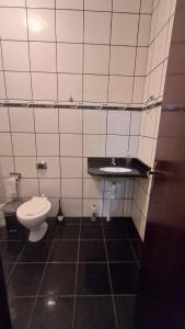 Ένα μπάνιο στο Santos & Oliveira