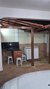 Η κουζίνα ή μικρή κουζίνα στο Santos & Oliveira