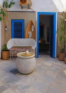 Et opholdsområde på Dar Mima Rooftop Sea View Private Jaccuzi + 13 billeder