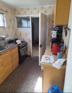 Η κουζίνα ή μικρή κουζίνα στο Pieza en el centro de La serena