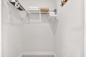 a laundry room with a drying rack and towels at Sleek Kitchenette & Queen Bed in Fort Lauderdale +18 photos