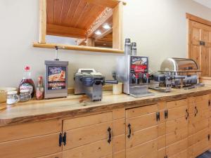 a kitchen with a counter with a mixer on it at Sandpoint Inn in Ponderay