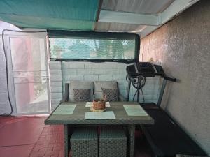 a table in a trailer with a phone on it at Rocas del sol in Las Vegas