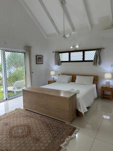 Postel nebo postele na pokoji v ubytování Vila Del Mare Oceanfront Villas
