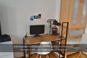 Μια τηλεόραση ή/και κέντρο ψυχαγωγίας στο Ruhige, sehr zentrale Wohnung in der Altstadt