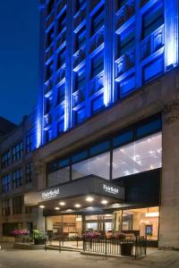 a building with blue lights on top of it at Fairfield Inn & Suites by Marriott Albany Downtown in Albany