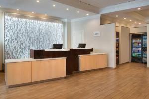 an empty lobby with a cashier counter in a store at Fairfield Inn & Suites by Marriott Albany Downtown in Albany