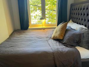 Postel nebo postele na pokoji v ubytování Cosy private room in a shared apartment + 10 fotografií