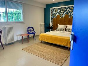 Postel nebo postele na pokoji v ubytování Groundfloor suite inn aparthotel