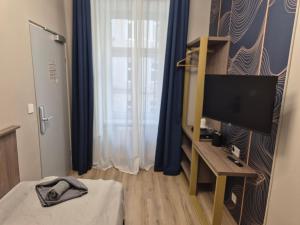 TV/trung tâm giải trí tại Nestroyplatz Rooms I Self Check In