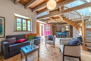 Posezení v ubytování Domaine de Linguinou