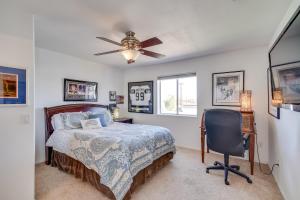 a bedroom with a bed and a ceiling fan at Magnificent Big River Home with Beautiful Views in Parker