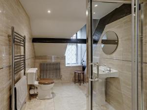 a bathroom with a toilet and a sink at 4 Bed in Llanover 91243 in Abergavenny +28 photos