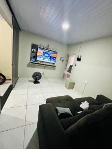 TV a/nebo společenská místnost v ubytování Casa para a cop 30 + 5 fotografií