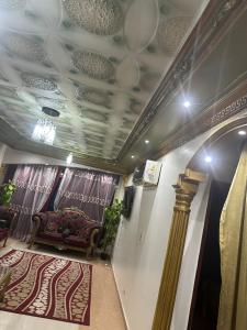 Posezení v ubytování Central flat in the heart of Zagazig + 2 fotografie