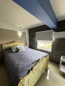 Postel nebo postele na pokoji v ubytování Luxury 2B Duplex in Old City Cartagena