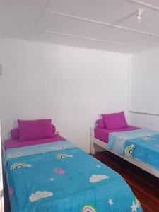 Postel nebo postele na pokoji v ubytování Sanali surf stay + 44 fotografií