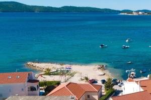 an aerial view of a beach with boats in the water at Studio Brodarica 15708b in Ražine +7 photos