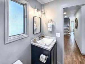 a bathroom with a sink and a mirror at Higher Ground in Highlands +41 photos