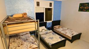 Ένα ή περισσότερα κρεβάτια σε δωμάτιο στο Tazrart tamraght