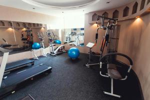 a room filled with a lot of different types of equipment at Shadow Boutique Hotel & Spa in Chişinău