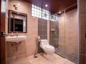 a bathroom with a toilet and a sink and a shower at Cozy-SJ-Family Holidays-Work-BBQ-Tea ceremony-Engagement in Subang Jaya +110 photos
