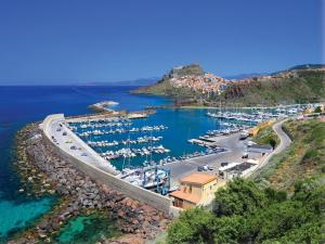an aerial view of a marina with boats in the water at Holiday home with sea view and large terrace in Castelsardo