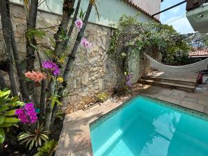 La alberca dentro o cerca de Vila Panse Quarto Duplo Deluxe 36 fotos más