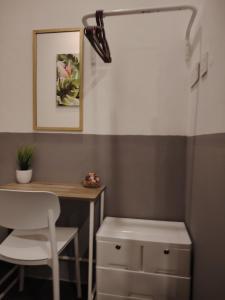 a desk and a chair in a room at F02 CoLiving Tebrau City 6min walk to AEON & Toppen & Ikea in Johor Bahru
