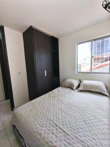 Ένα ή περισσότερα κρεβάτια σε δωμάτιο στο Portobelho +6 φωτογραφίες