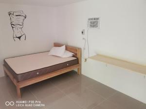 Postel nebo postele na pokoji v ubytování Jungle restobar