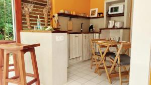 Kuchyň nebo kuchyňský kout v ubytování Akamao + 8 fotografií