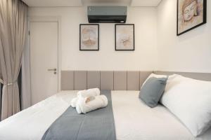 Postel nebo postele na pokoji v ubytování Modernidade no Batel | Suíte luxo