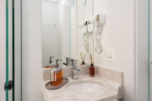 Koupelna v ubytování Modernidade no Batel | Suíte luxo + 24 fotografií