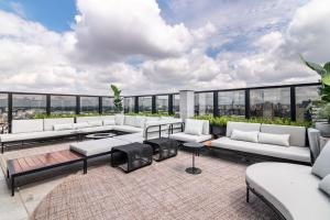 Posezení v ubytování Modernidade no Batel | Suíte luxo